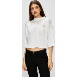Puma - Top. Szare topy damskie Puma, z aplikacjami, z bawełny, z okrągłym kołnierzem, z krótkim rękawem. W wyprzedaży za 159.90 zł.