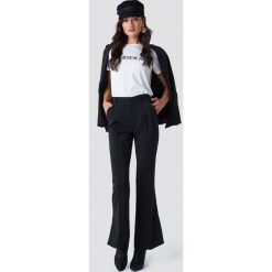 NA-KD Classic Spodnie garniturowe Seamline - Black. Czarne spodnie materiałowe damskie NA-KD Classic, z poliesteru. Za 202.95 zł.