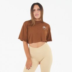 Koszulka crop top damska COSMIC LOVE brązowa. Brązowe koszulki sportowe damskie Legea, bez wzorów, z bawełny, na fitness i siłownię. Za 52.00 zł.