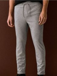 Spodnie dresowe jogger z domieszką wiskozy - szary. Szare spodnie sportowe męskie Sinsay, l, bez wzorów, z dresówki. Za 49.99 zł.