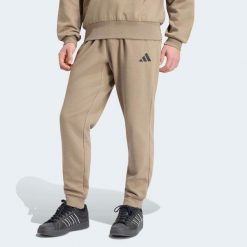 Spodnie dresowe męskie ADIDAS. Spodnie sportowe męskie Adidas, m, bez wzorów, z bawełny, na fitness i siłownię. Za 219.99 zł.