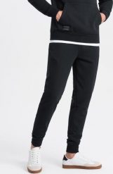 Ombre Bawełniane spodnie męskie dresowe joggery BASIC czarne V9 OM-PABS-0174 XXL. Czarne spodnie sportowe męskie Ombre, m, bez wzorów, z bawełny. Za 129.99 zł.