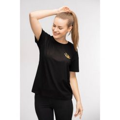 T-shirt do jogi Moonholi Awaken z krótkim rękawem. Czarne koszulki sportowe damskie MOONHOLI, m, bez wzorów, sportowe, bez kołnierzyka. Za 99.00 zł.