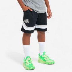 Spodenki do koszykówki dla dzieci NBA SH900. Czarne spodenki dla dziewczynek TARMAK, bez wzorów, z materiału, młodzieżowe. Za 79.99 zł.