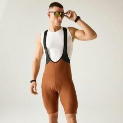 Męskie spodenki kolarskie Ultra Bibbed. Brązowe szorty męskie Dare 2b, m, bez wzorów, z elastanu. Za 449.99 zł.