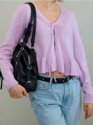 Kardigan z wiązaniem i dekoracyjną falbaną z domieszką wełny - różowy. Czerwone kardigany damskie Sinsay, l, bez wzorów, z wełny. Za 59.99 zł.