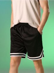 Sportowe szorty z kontrastową lamówką - czarny. Czarne krótkie spodenki sportowe męskie Sinsay, l, bez wzorów. Za 39.99 zł.