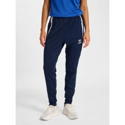 Damskie spodnie treningowe Hummel Lead 2.0. Niebieskie spodnie sportowe damskie Hummel, bez wzorów, na fitness i siłownię. Za 197.00 zł.