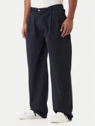 Guess Jeans Spodnie materiałowe M6RB59 WGCV1 Granatowy Relaxed Fit. Niebieskie spodnie materiałowe męskie Guess Jeans, m, z aplikacjami, z bawełny. Za 389.99 zł.