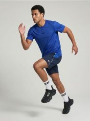 Szorty sportowe SNSY PERFORMANCE - granatowy. Niebieskie krótkie spodenki sportowe męskie Sinsay, l, bez wzorów. Za 39.99 zł.
