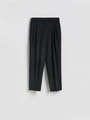 Spodnie carrot fit - czarny. Czarne spodnie materiałowe damskie Reserved, l, bez wzorów, z tkaniny. Za 179.99 zł.