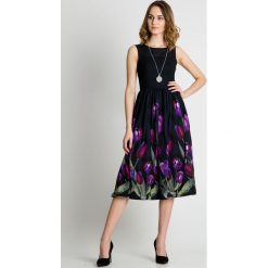 Sukienka midi z kwiatami u dołu BIALCON. Czarne sukienki damskie BIALCON, na lato, z materiału, eleganckie. Za 449.00 zł.