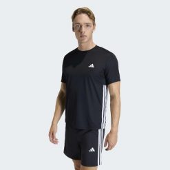 Second Life - Koszulka fitness męska ADIDAS Workout Essentials Base - Stan Dobry. Czarne koszulki sportowe męskie Adidas, l, bez wzorów, z materiału, bez kołnierzyka, bez ramiączek, na fitness i siłownię, climacool (adidas). Za 66.99 zł.