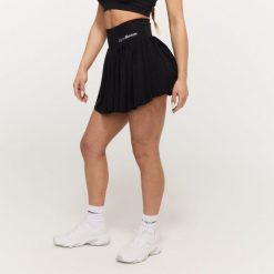 Spódnico-spodenki damskie fitness czarne BEAT. Czarne szorty sportowe damskie GYMBEAM, s, bez wzorów, z elastanu, sportowe, do biegania. Za 113.90 zł.