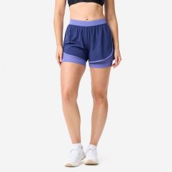 Spodenki fitness cardio damskie Domyos 2 w 1. Fioletowe szorty sportowe damskie DOMYOS, l, bez wzorów, z materiału, sportowe, na fitness i siłownię. Za 69.99 zł.