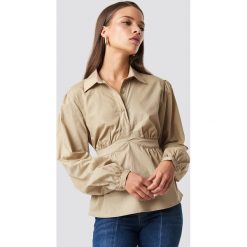 NA-KD Trend Krótka koszula z miseczkami - Beige. Koszule damskie marki NA-KD Trend. Za 80.95 zł.