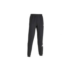Spodnie dresowe Gym & Pilates regular męskie. Szare spodnie sportowe męskie Puma, m, bez wzorów, z bawełny, na jogę i pilates. Za 129.99 zł.