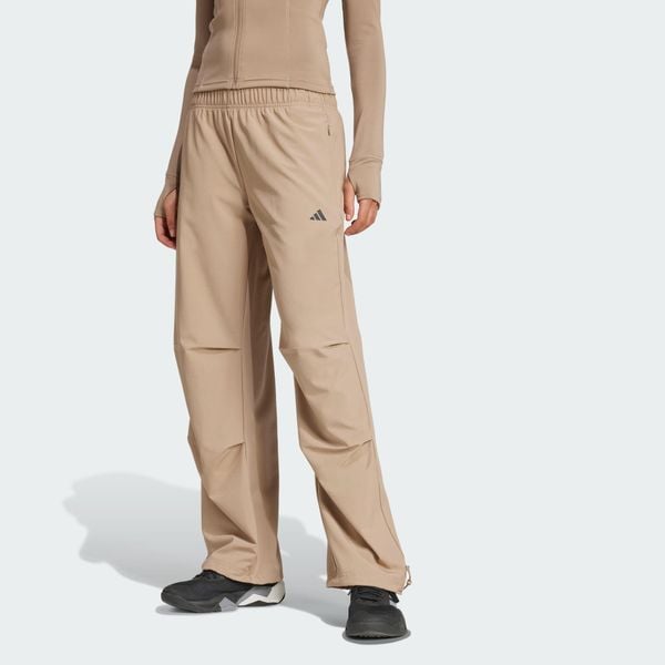 Spodnie treningowe Workout Essentials Woven. Czarne spodnie sportowe damskie Adidas, xl, bez wzorów, z elastanu, na fitness i siłownię, climacool (adidas). Za 219.00 zł.