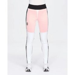Spodnie narciarskie dla kobiet Daehlie Sportswear Thermo Pro. Białe spodnie snowboardowe damskie DAEHLIE, l, bez wzorów, z materiału, narciarskie. Za 800.50 zł.