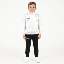 Komplet dresowy dla chłopca TEXAS JUNIOR JR. Białe spodnie sportowe dla chłopców Legea, bez wzorów, z dresówki, sportowe, na jogę i pilates. W wyprzedaży za 76.00 zł.