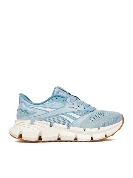 Reebok Buty do biegania EO-FLOATZIG 2 100244482 Niebieski. Niebieskie obuwie sportowe damskie Reebok, bez wzorów, z materiału, do biegania. Za 302.99 zł.
