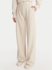 Guess Spodnie dresowe V6RB03 KD761 Kremowy Wide Leg. Białe spodnie dresowe damskie Guess, s, z aplikacjami, z bawełny. Za 294.99 zł.