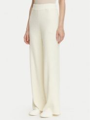 Guess Spodnie dzianinowe O6BB01 Z1147 Kremowy Regular Fit. Białe spodnie materiałowe damskie Guess, xl, z aplikacjami, z dzianiny. Za 344.99 zł.