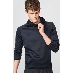 Sportowa bluza z kapturem - Szary. Bluzy sportowe męskie marki KALENJI. W wyprzedaży za 59.99 zł.