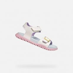 Sandały GEOX J SANDAL FUSBETTO GI Biały. Białe sandały damskie Geox, bez wzorów, z syntetyku, bez obcasa, bez zapięcia. Za 195.50 zł.