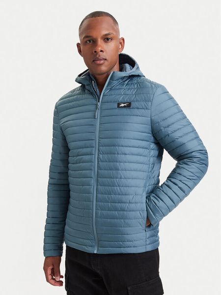 Reebok Kurtka przejściowa RCC00086 Niebieski Regular Fit. Niebieskie kurtki męskie Reebok, m, bez wzorów, z syntetyku, bez kaptura. Za 282.99 zł.