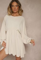 Jasnobeżowa Rozkloszowana Sukienka z Gumką w Talii i przy Mankietach Tesunela. Brązowe sukienki damskie Renee, na co dzień, bez wzorów, eleganckie, bez kołnierzyka, bez ramiączek, mini, rozkloszowane. Za 69.99 zł.