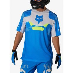 Koszulka enduro męska Fox Ranger SS Jersey Tactile. Niebieskie koszulki sportowe męskie FOX, m, bez wzorów, z jersey, bez kołnierzyka, bez ramiączek, rowerowe. Za 219.99 zł.