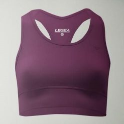 Crop top sportowy treningowy FEBE. Fioletowe obuwie sportowe damskie Legea, bez wzorów, z materiału, na fitness i siłownię. W wyprzedaży za 84.50 zł.