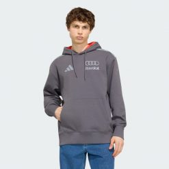 BLUZA Z KAPTUREM AUDI REVOLUT F1 TEAM DRIVER. Fioletowe bluzy męskie Adidas, l, bez wzorów, z bawełny, z kapturem. Za 409.00 zł.