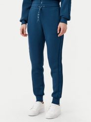 Guess Spodnie dresowe V2YB18 K7UW2 Niebieski Regular Fit. Niebieskie spodnie dresowe damskie Guess, xxs, z aplikacjami, z dresówki. Za 209.99 zł.