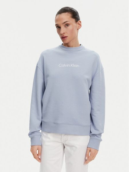 Calvin Klein Bluza Hero Logo K20K205450 Błękitny Regular Fit. Niebieskie bluzy damskie Calvin Klein, s, bez wzorów, z bawełny, bez kaptura. Za 239.99 zł.