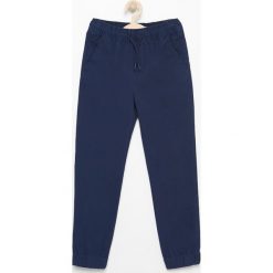 Spodnie jogger - Granatowy. Spodnie materiałowe dla chłopców marki Reserved. Za 149.99 zł.