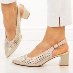 Złote ażurowe czółenka damskie bez pięty Sergio Leone Sk463. Żółte czółenka damskie Sergio Leone, w ażurowe wzory, ze skóry, biznesowe, bez obcasa, na obcasie, bez zapięcia. Za 179.00 zł.