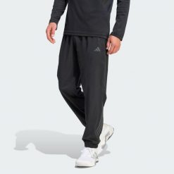Spodnie Dresowe Tech Essentials Workout. Czarne buty sportowe męskie Adidas, bez wzorów, z dresówki, na fitness i siłownię, climacool (adidas). Za 279.00 zł.