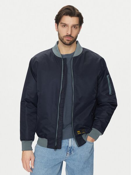 Vans Kurtka bomber VN000HMQJDU1 Granatowy Regular Fit. Niebieskie kurtki męskie Vans, l, bez wzorów, z syntetyku, bez kaptura. Za 309.99 zł.