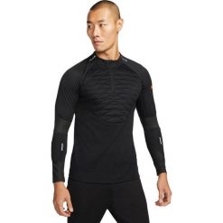 Bluza treningowa męska Nike Techfit Strike Drill Top Winter Warrior. Czarne bluzy męskie Nike, m, bez wzorów, bez kaptura. W wyprzedaży za 170.15 zł.