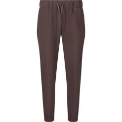 Damskie spodnie dresowe Athlecia Austberg. Brązowe spodnie dresowe damskie Endurance, bez wzorów, z dresówki, na fitness i siłownię. Za 193.50 zł.