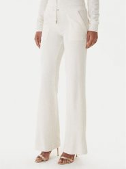 Juicy Couture Spodnie dresowe Layla JCSEBJ001G Beżowy Regular Fit. Brązowe spodnie dresowe damskie Juicy Couture, l, bez wzorów, z dresówki. Za 349.99 zł.