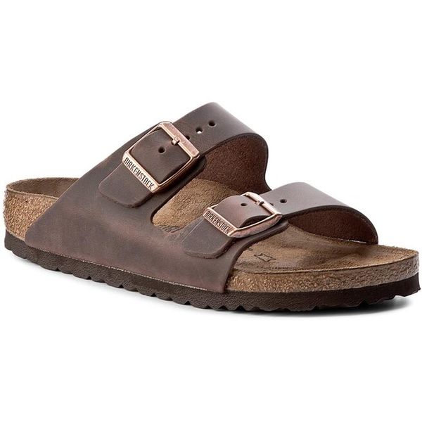 Klapki Birkenstock. Czarne klapki damskie Birkenstock, bez wzorów, bez obcasa. Za 399.99 zł.