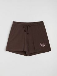 Luźne szorty z bawełną - brązowy. Brązowe szorty damskie Sinsay, l, bez wzorów, z bawełny. Za 29.99 zł.