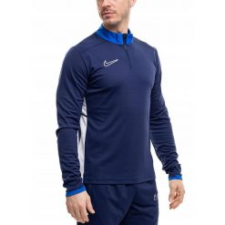 Męska bluza piłkarska Nike Dri-FIT Academy 25 Drill Top. Niebieskie bluzy męskie Nike, m, bez wzorów, z poliesteru, bez kaptura. Za 141.99 zł.
