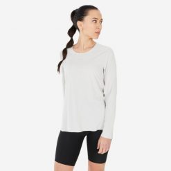 Koszulka turystyczna damska z długim rękawem Quechua MH500. Brązowe koszulki sportowe damskie QUECHUA, xl, bez wzorów, z materiału, sportowe, bez kołnierzyka. Za 79.99 zł.