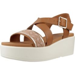 Sandały GEOX D XAND 2.2S Brązowy. Brązowe sandały damskie Geox, bez wzorów, ze skóry, bez obcasa, bez zapięcia. Za 433.99 zł.