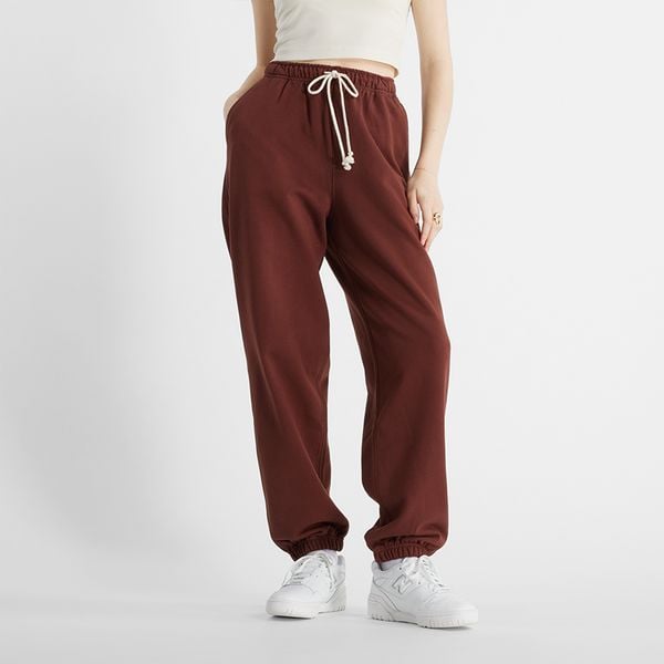 Spodnie damskie New Balance WP41513ROK – brązowe. Brązowe spodnie sportowe damskie New Balance, l, bez wzorów, z bawełny. Za 169.99 zł.