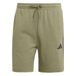 Szorty adidas Essentials 3-Stripes. Brązowe krótkie spodenki sportowe męskie Adidas, m, bez wzorów, z bawełny, do biegania. Za 194.00 zł.
